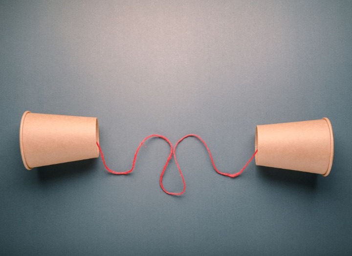 cups with string making a phone toy