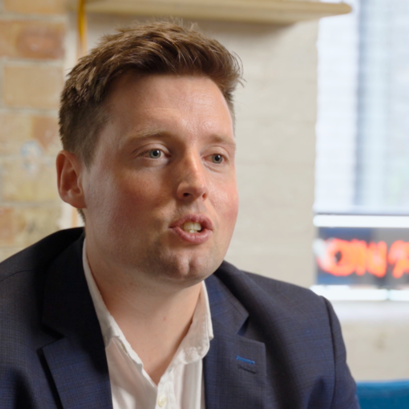 Comms Search consultant discussing executive recruitment strategy