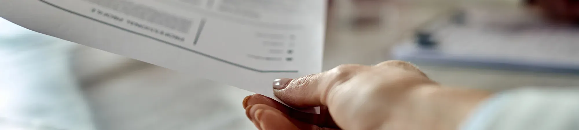 Generic image of a person looking at printed documents