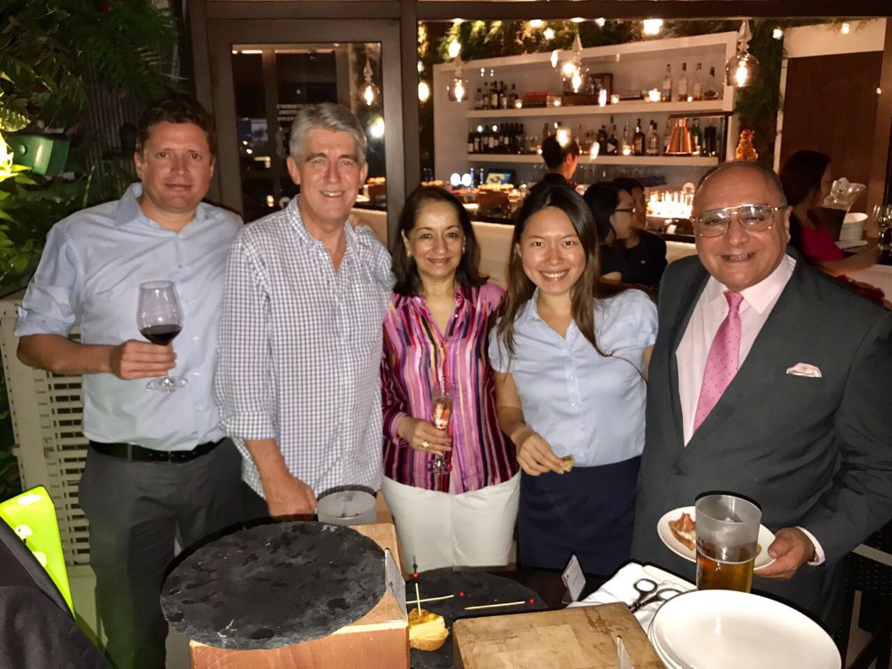 Travel industry networking three men and two women