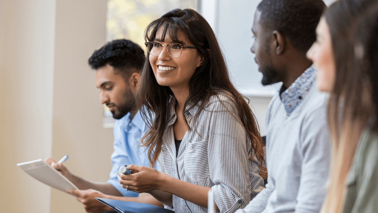 A smiling employee enjoying work