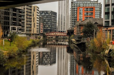 Canal in Manchester with high rise buildings