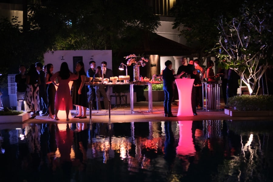 evening photo of people networking