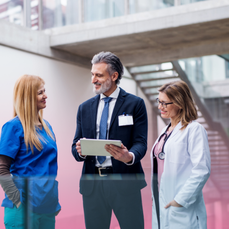 Doctor talking to registered nurse