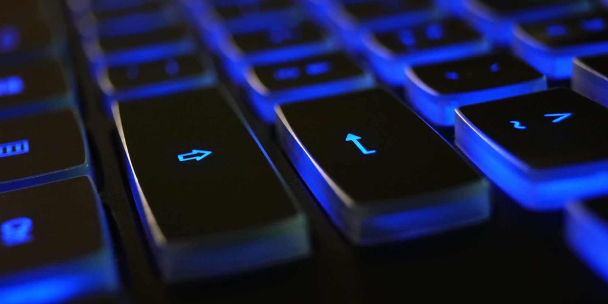 Closeup Photo Of Black And Blue Keyboard 1194713