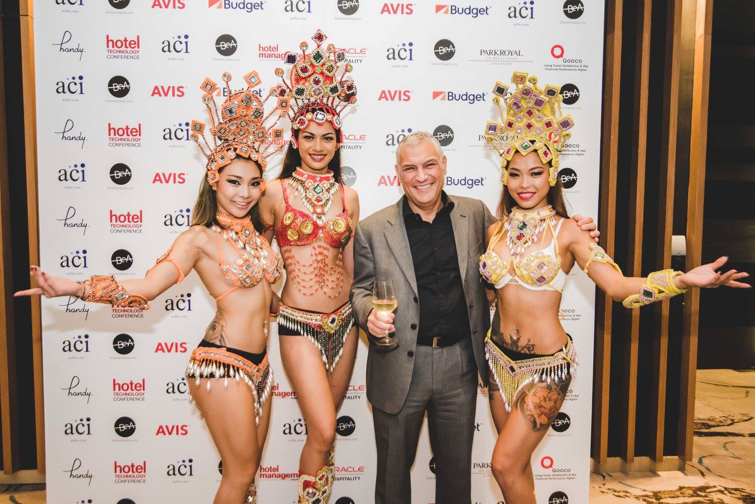 Hospitality networking man and three Brazilian dancers
