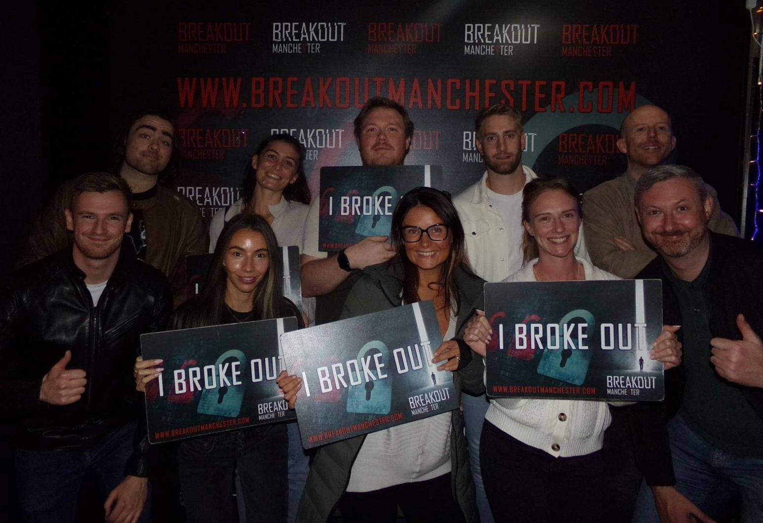 WRS Employees holding I broke out signs at Break Out Manchester