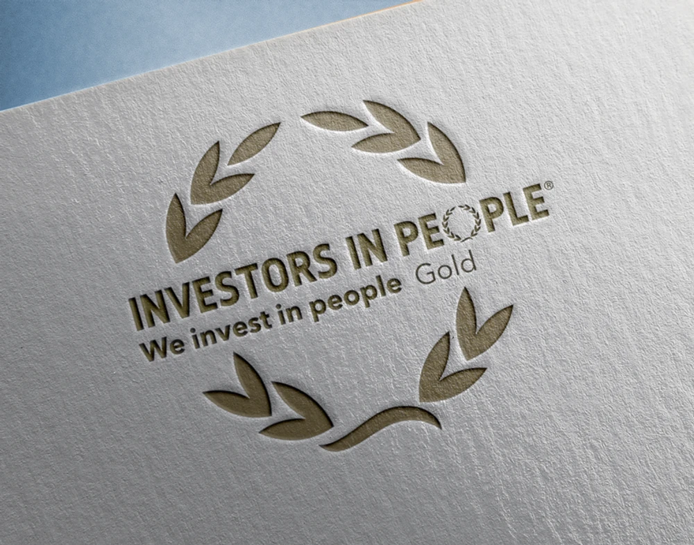 The Investors in people logo on paper