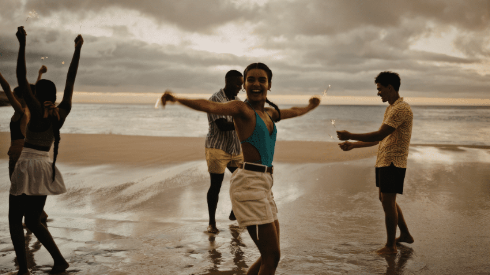 a group of people enjoying the beach