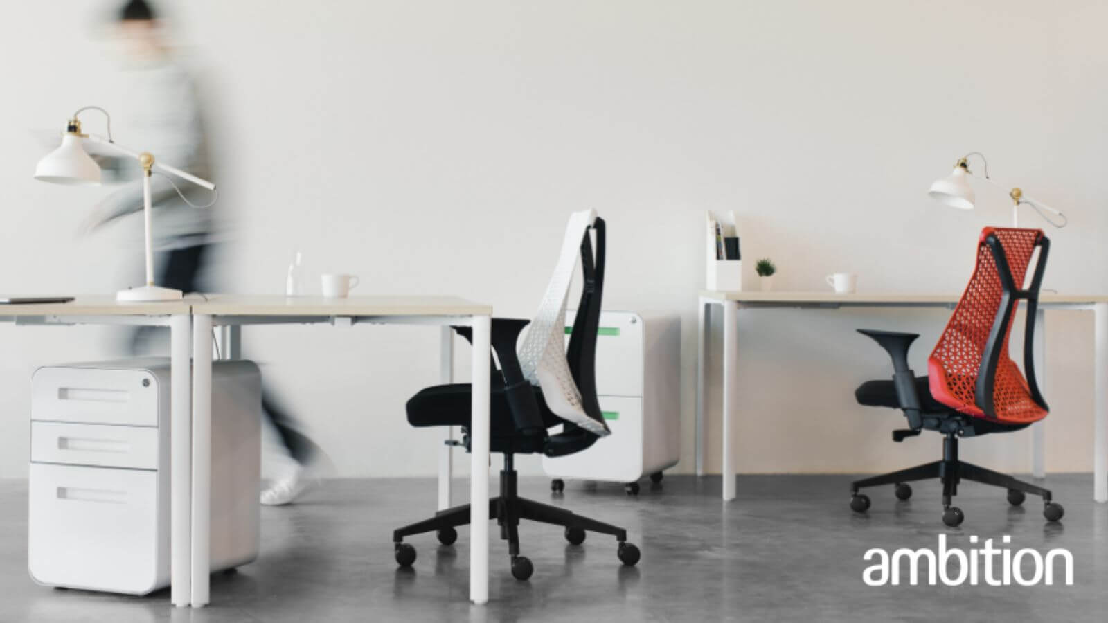 Empty office desks and chairs