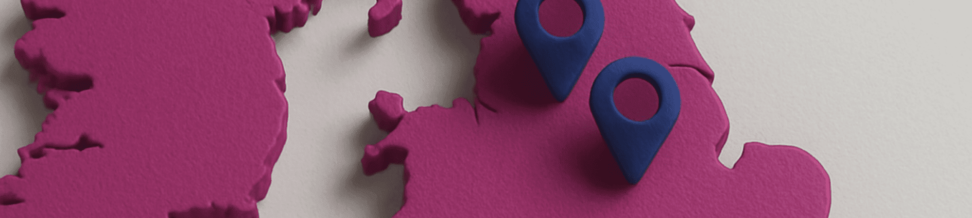 Map of the UK with two dark purple location pins on central England, set against a blue background. The bright purple land contrasts with the grey sea.