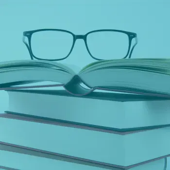 Green image of books with pair of glasses on top