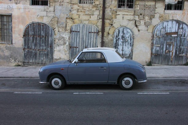 A car parked on the side of a road  Description automatically generated with medium confidence