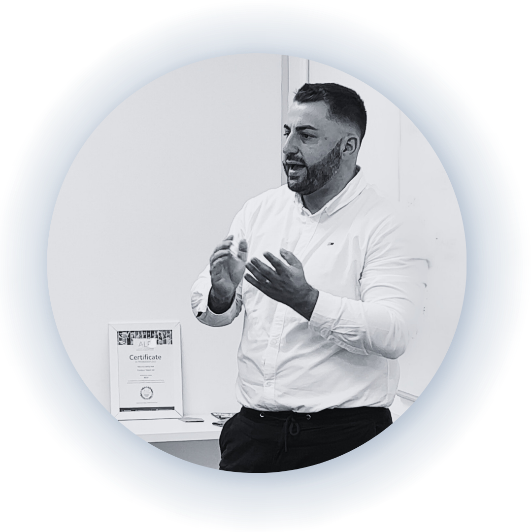  Candour Talent Recruitment Agency - Our Values page. An image of our Managing Director Matthew Burkitt presenting or talking to his employees, reflecting our commitment to leadership and communication in fostering a positive work environment.