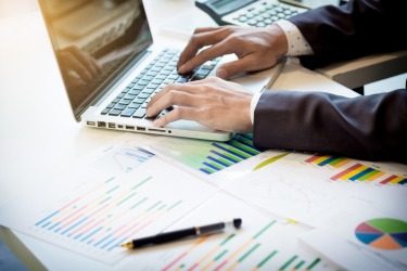 Finance recruiter working on laptop