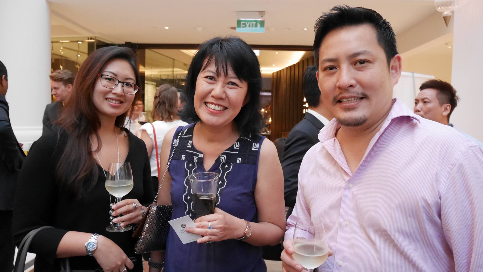 Networking photo of man and two women