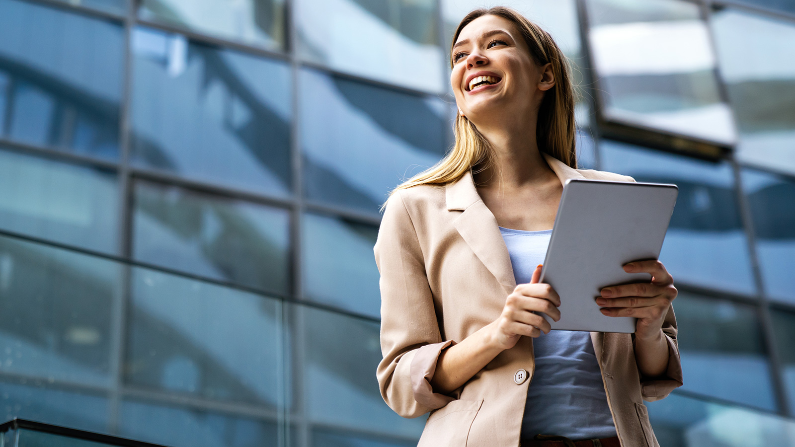 woman-smiling-business-attire-motivated