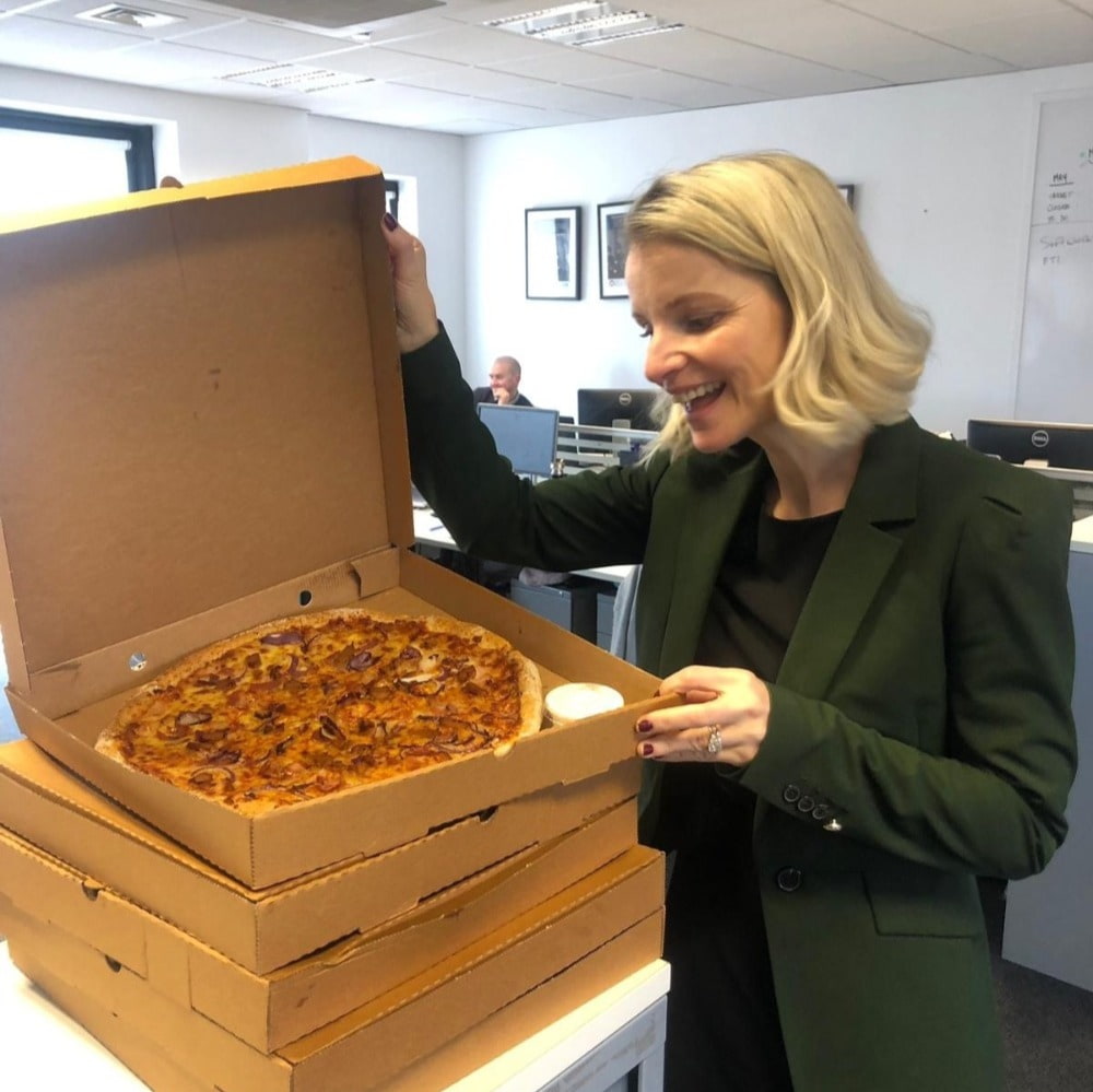 Culture at Cpl employee enjoying pizza