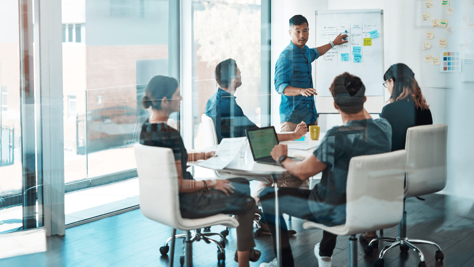 A team of project managers in a strategy meeting