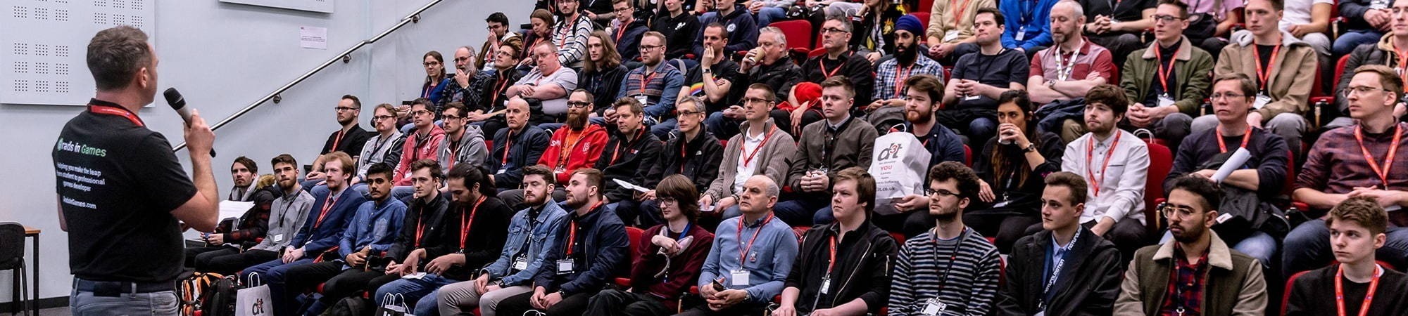 Games students and games developers in a lecture theatre at the Grads in Games finals day event