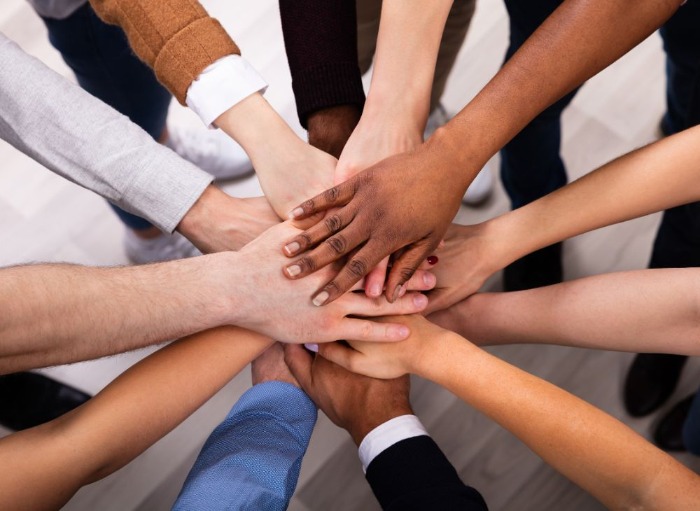 hands depicting diverse range of skin colours