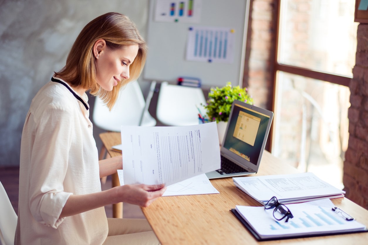 Image of blonde former teacher smiling, having found an alternative job