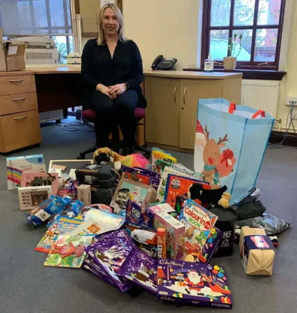 Kate Barnard with christmas presents