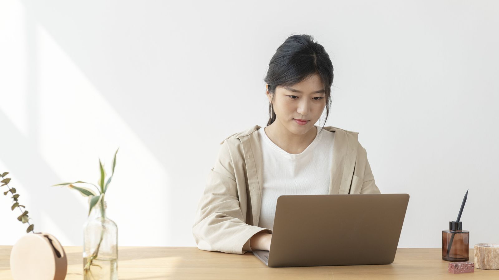 Asian Woman Home Using Laptop Min