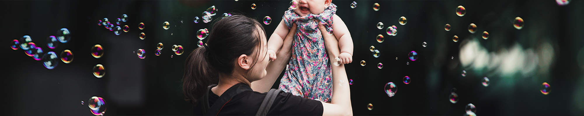 Working for VMAGROUP: Back to the office... but not as we know it - Woman and a toddler with bubbles