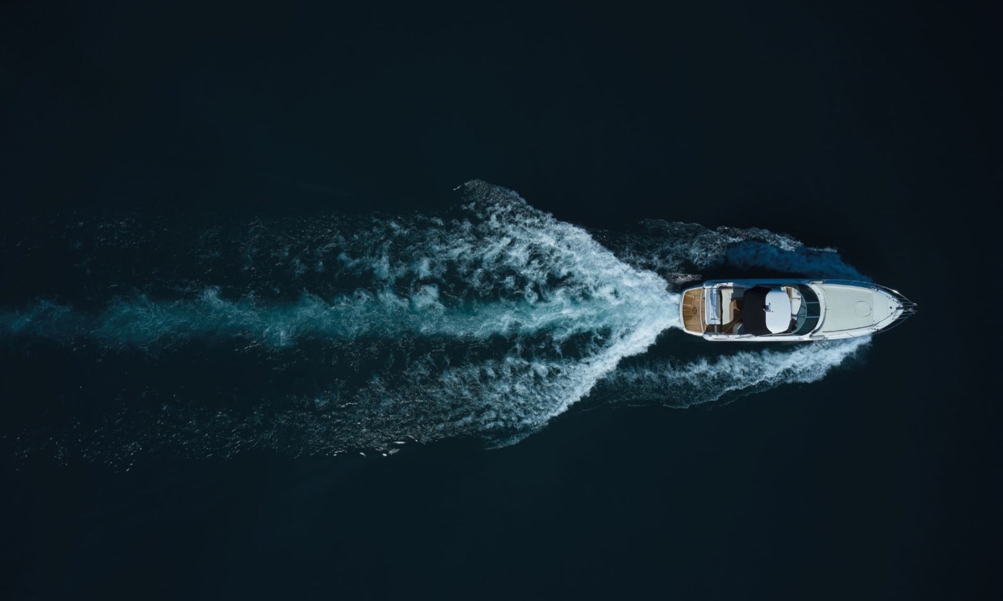 workers at a boat factory site
