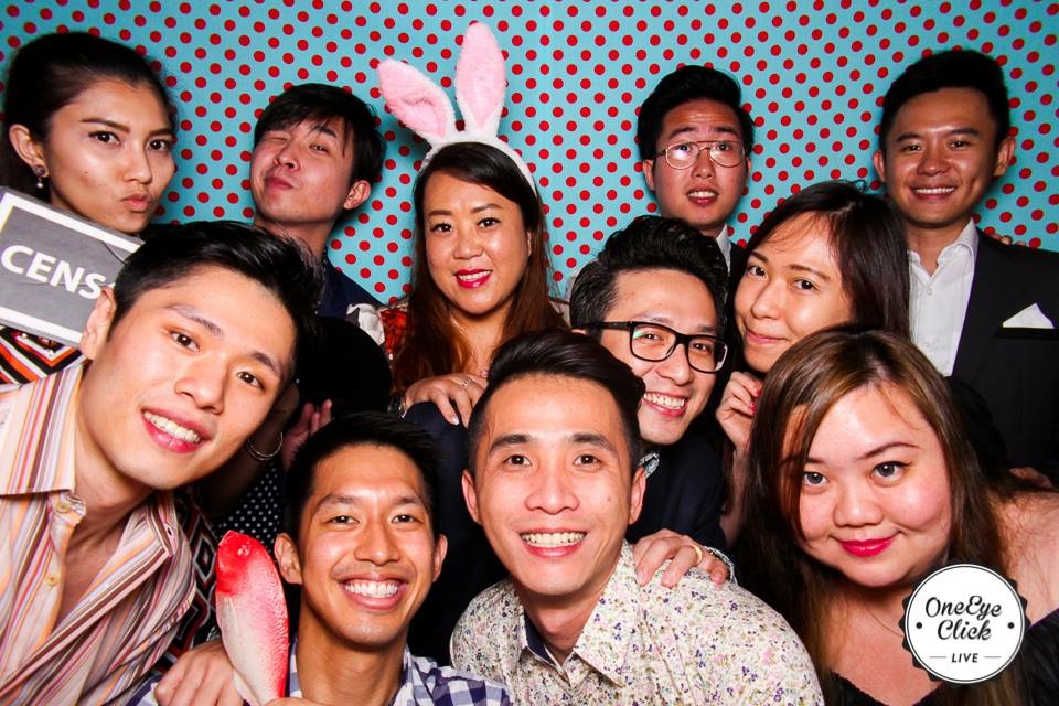 group of people in photobooth
