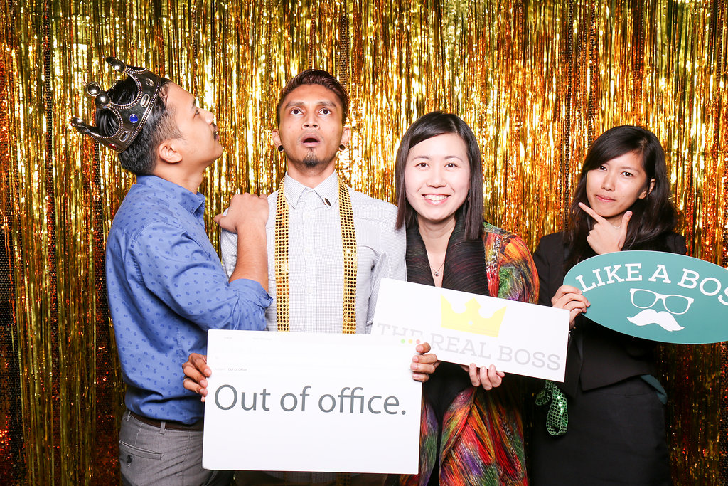 Photobooth photo with two women and two men