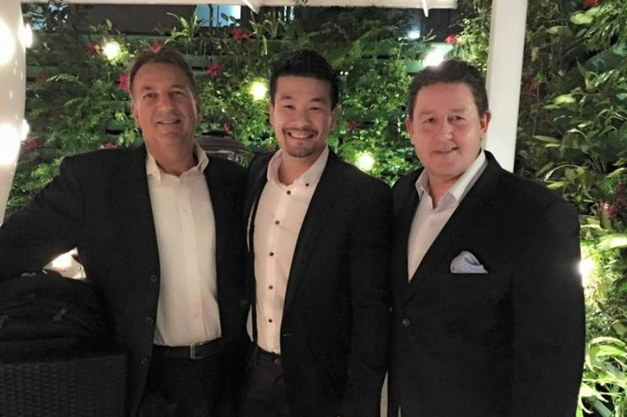 Networking photo of three men