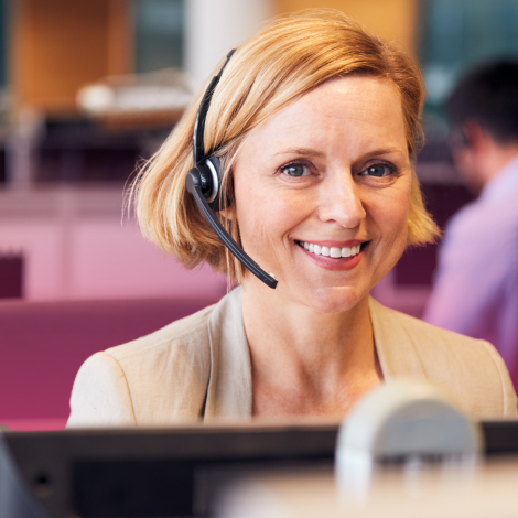 woman talking on headpiece telesales and telemarketing