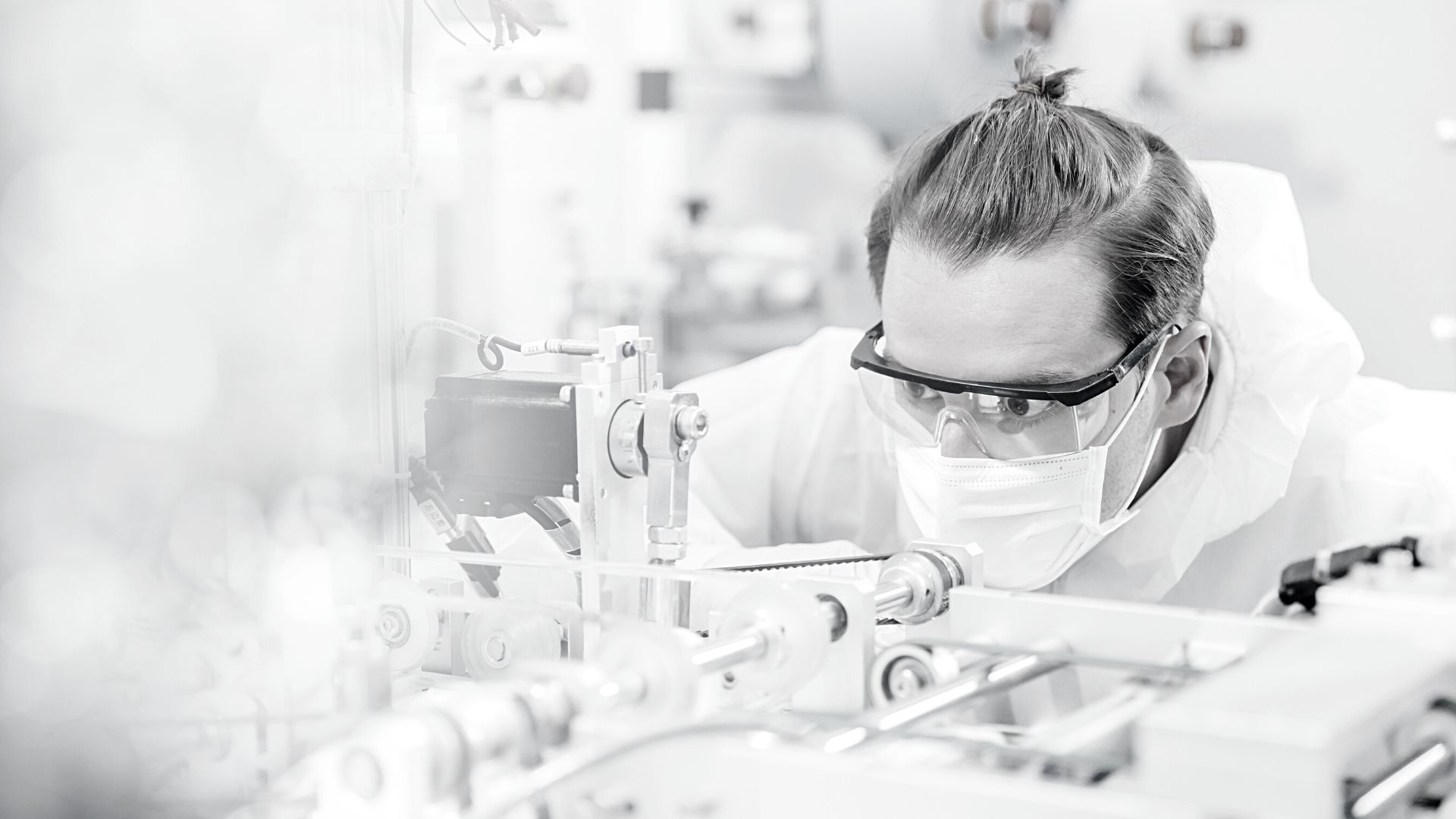 Science graduates working in lab