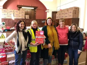 Michelle Finan with the Finance Team volunteering at a Christmas Shoebox Appreal