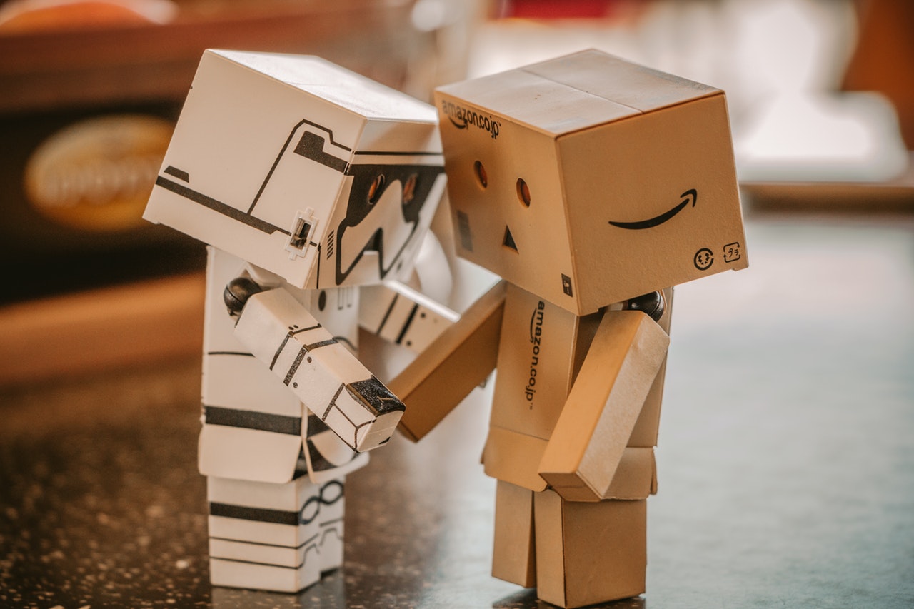 Photo Of White And Brown Cardboard Box Toy Figure 678308
