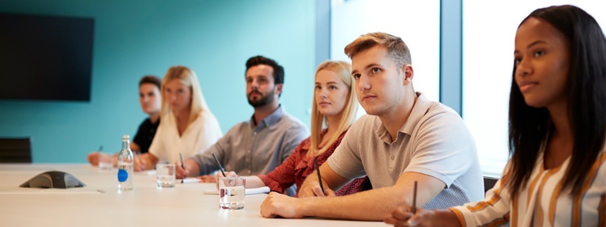 team of working professionals in team meeting 