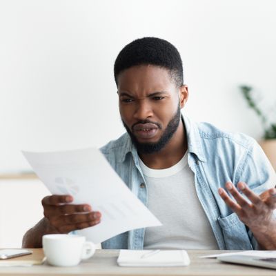 Frustrated Employee Shocked By Reading Financial R 2021 08 30 02 14 57 Utc