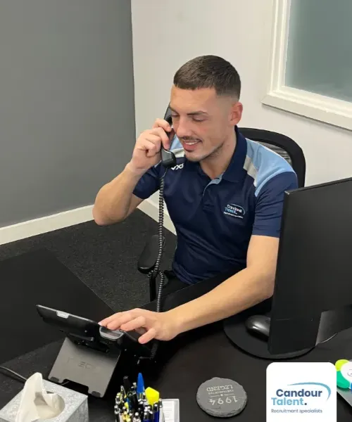 Candour Talent Recruitment Agency - Permanent Jobs Page. Featuring Senior Sales Recruitment Consultant Scott Smith on the phone, embodying our proactive approach to client engagement and personalized recruitment solutions, reflecting our dedication to excellence in service delivery