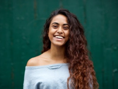 girl in grey off the shoulder top, mixed race