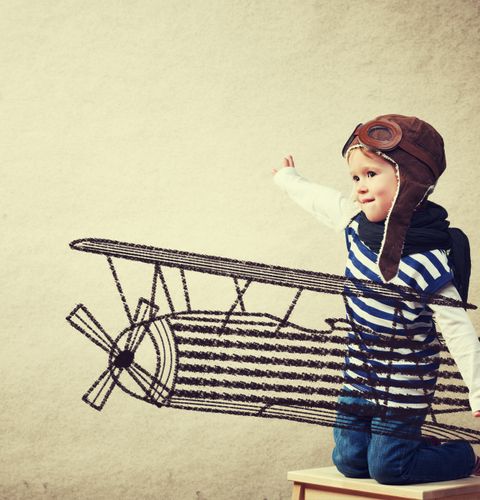 I Stock 495613456 Child With Drawing Plane