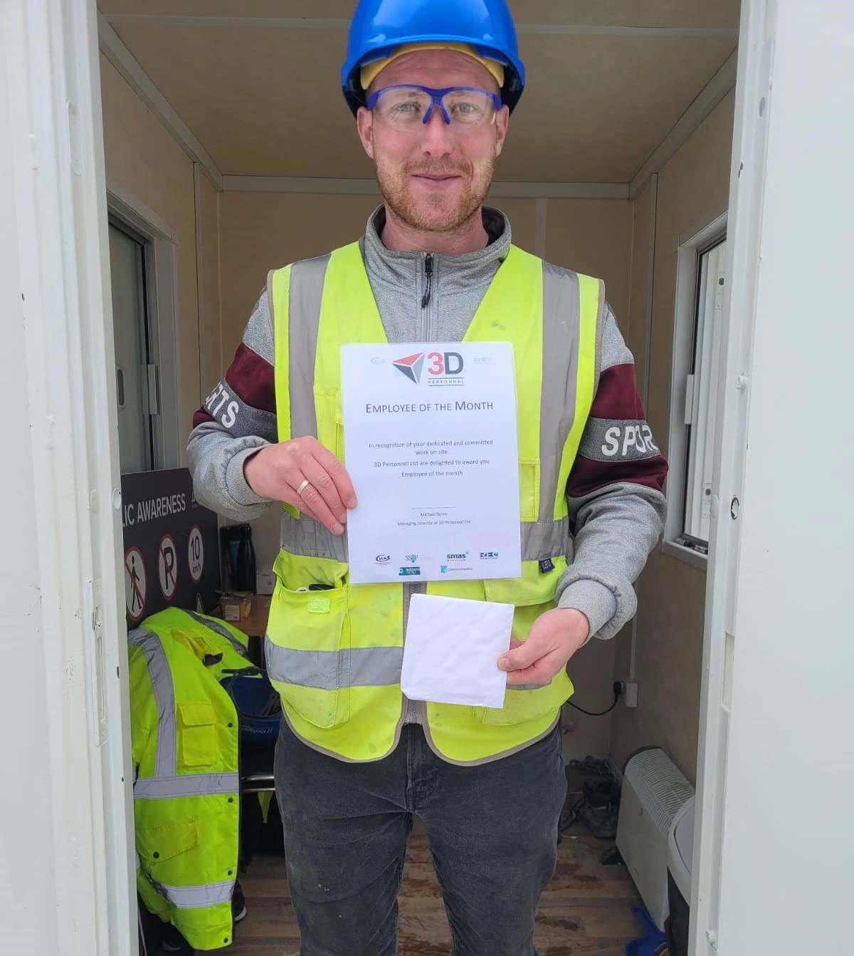 Mark with his award at the site office