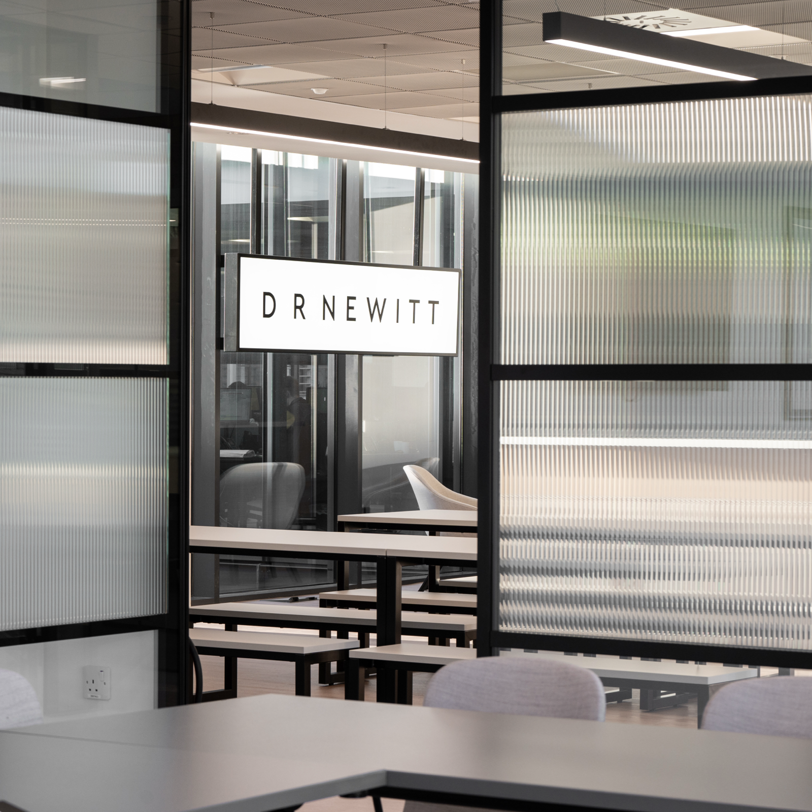 D R Newitt Edinburgh Office meeting room and sign