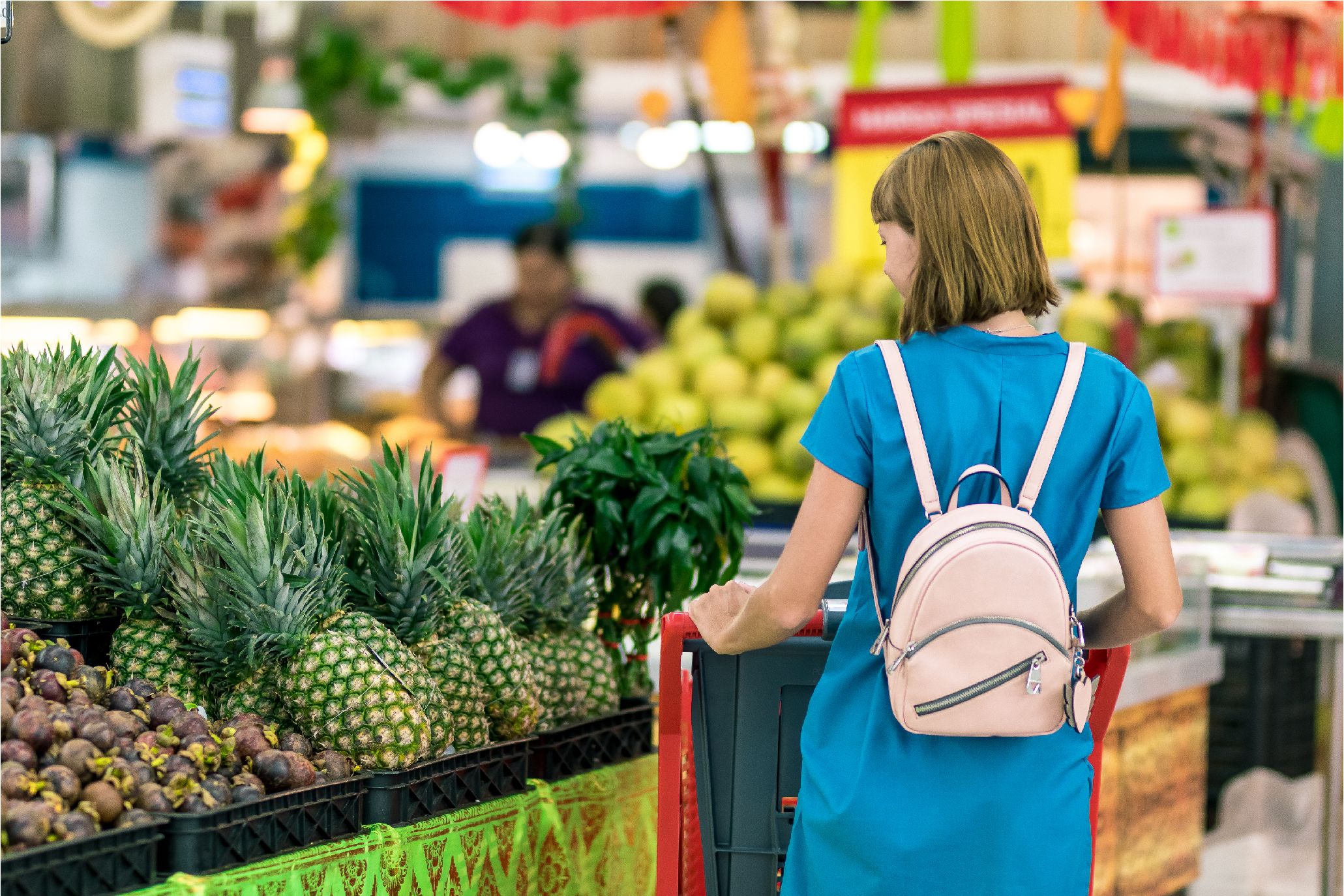 Canva   Woman Standing Beside Pineapple Fruits