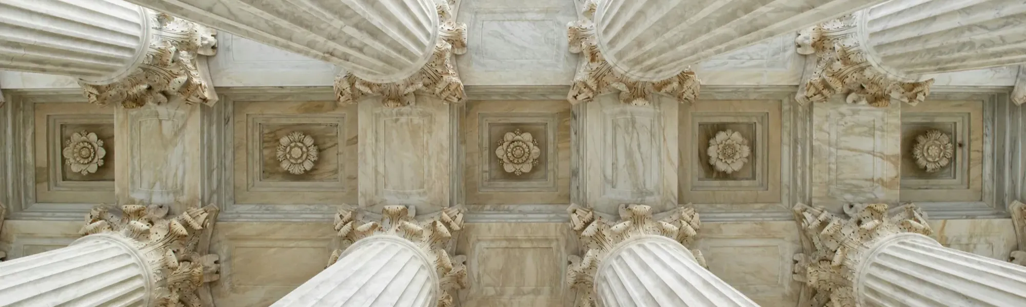 Stone pillars and ornate ceiling from a historic building