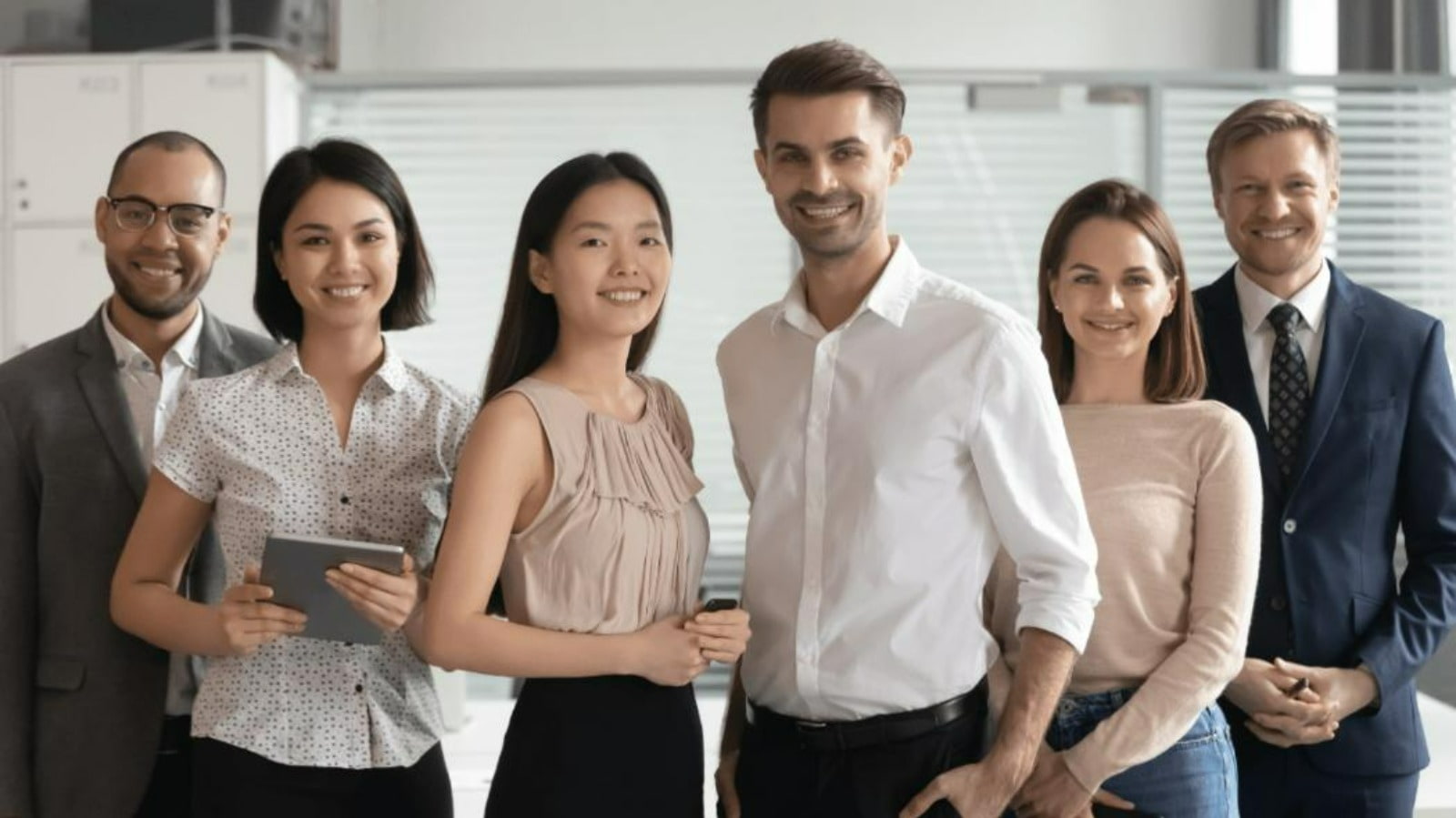A group of corporate people smiling