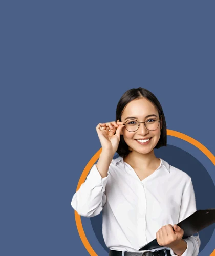 Manufacturing executive search – smiling professional with glasses holding a clipboard, Select Headhunter Indonesia