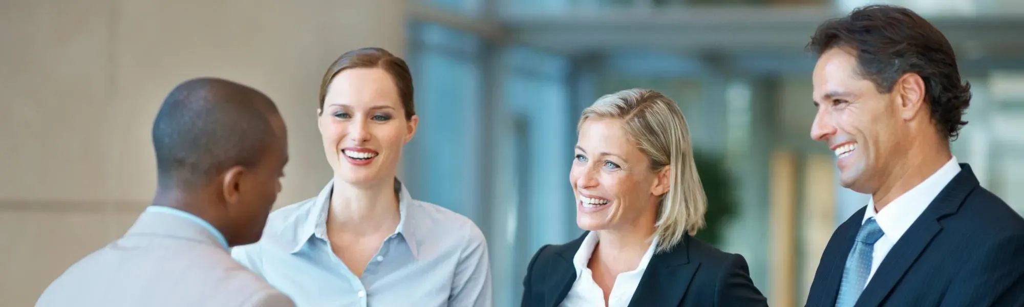 Three business people talking