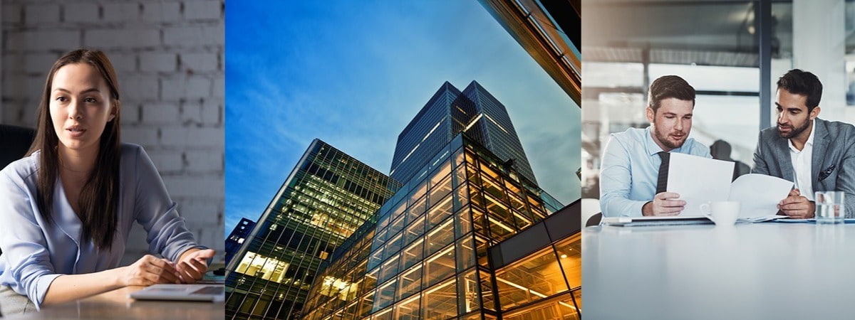 woman at a laptop, high rise glass building, 2 men comparing notes